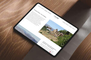 mockuuups ipad pro landscape mockup on curved wooden surface