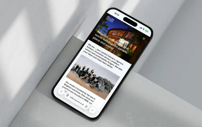 mockuuups iphone 16 mockup on marble with shadows