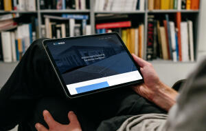 mockuuups ipad air mockup on a users lap