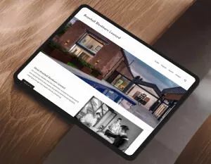 mockuuups ipad pro landscape mockup on curved wooden surface