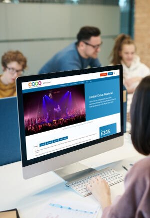 mockuuups imac mockup on a table in an office