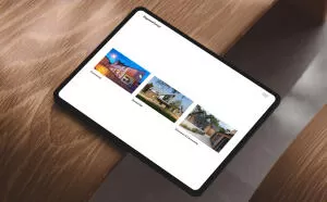 mockuuups ipad pro landscape mockup on curved wooden surface