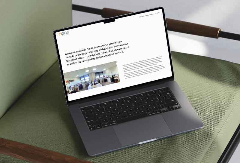 mockuuups macbook air mockup on a green armchair