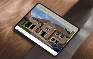 mockuuups ipad pro landscape mockup on curved wooden surface