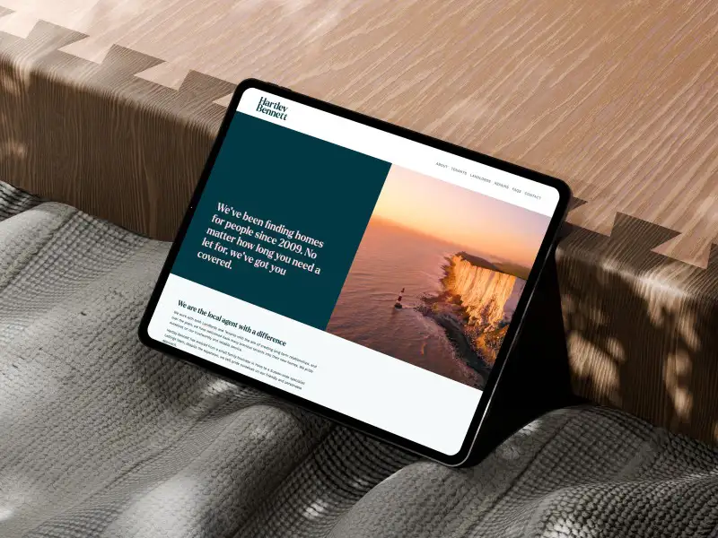 mockuuups free ipad pro mockup on textured fabric and wooden surface